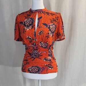Free People Size Medium Hear Me Roar Printed Keyhole Top